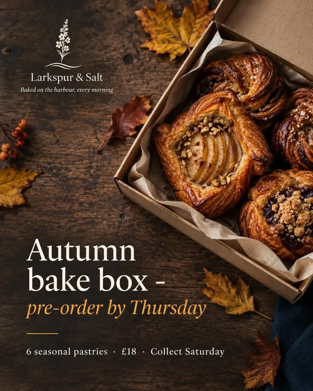 A dark, moody shot of an open box of pastries on a wooden table with the headline in cream and gold